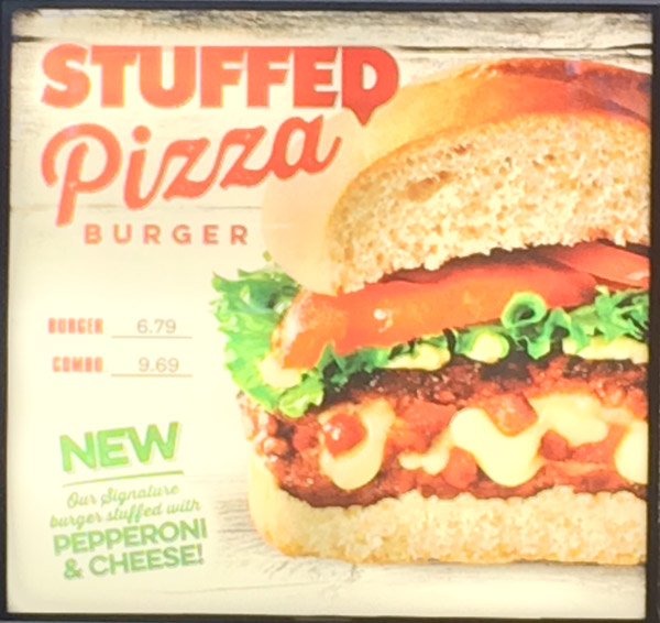 Review: Harvey’s Mysterious New Stuffed Pizza Burger (Update: Mystery Solved)